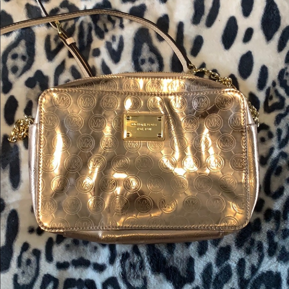 Used Micheal Kor rose gold handbag